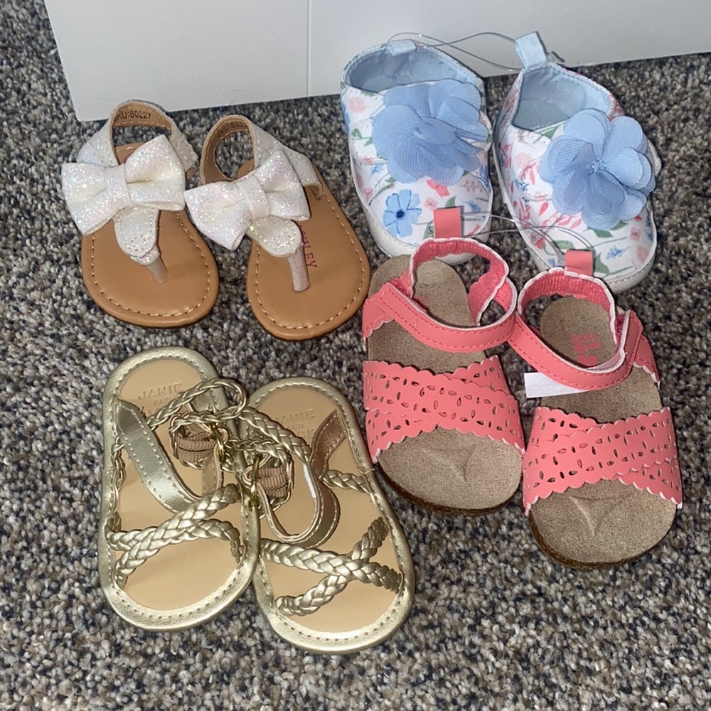 4 pairs of  New Baby girl shoes